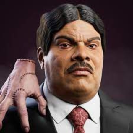 Luis Guzman as Gomez Addams in Wednesday.